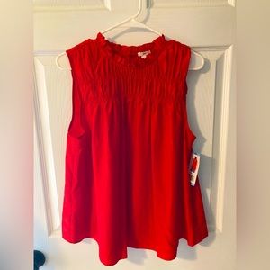 New with tags Cayenne Red Joie blouse with smocking detail, ruffled neckline